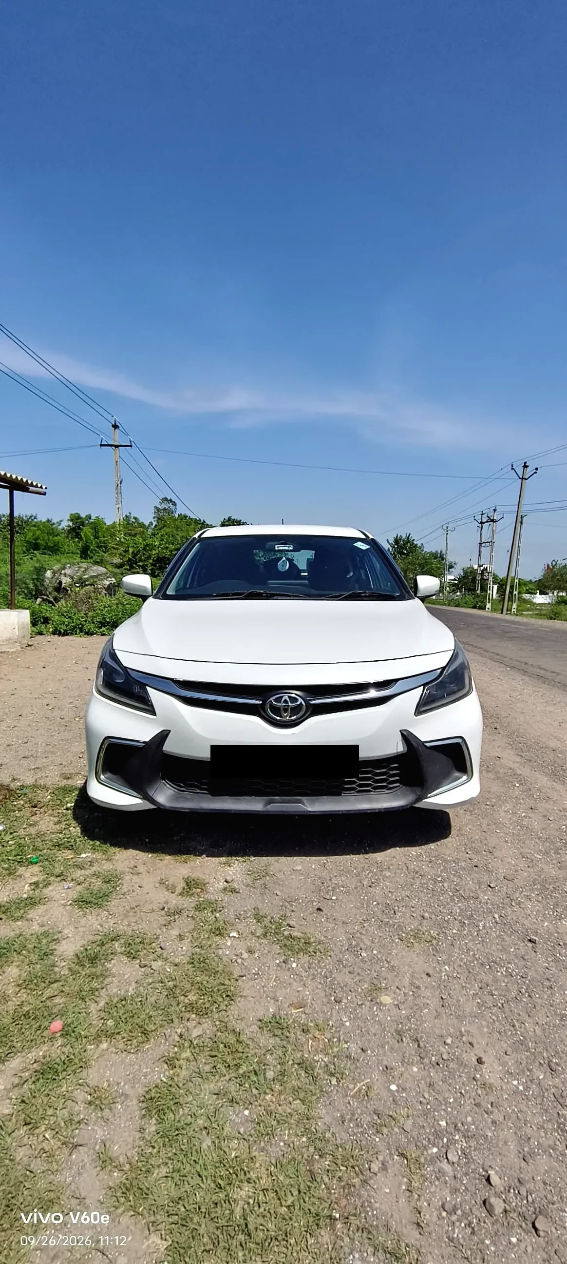 Toyota Glanza G CNG car rental Rajkot