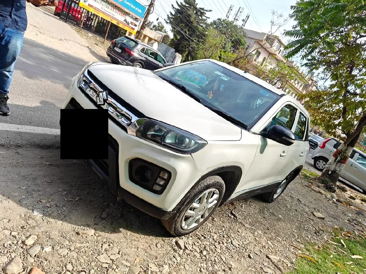 V Brezza LXI airport rental Dehradun